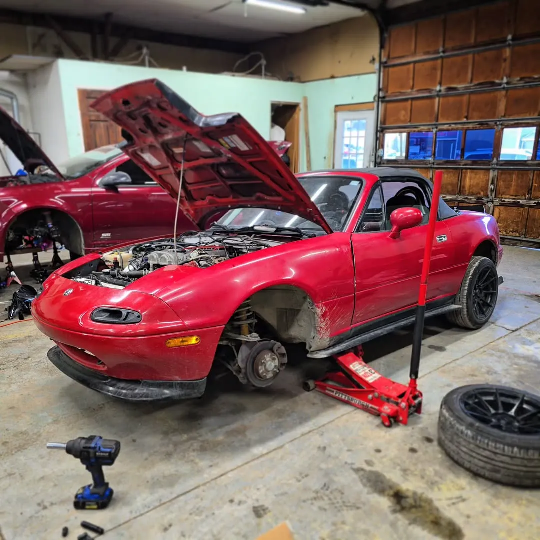 Car Enthusiast Working on Engine